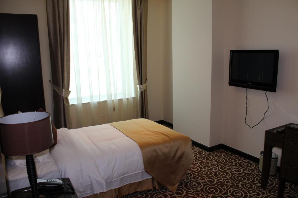 Mathema Premium Aparthotel Doha Quarto foto